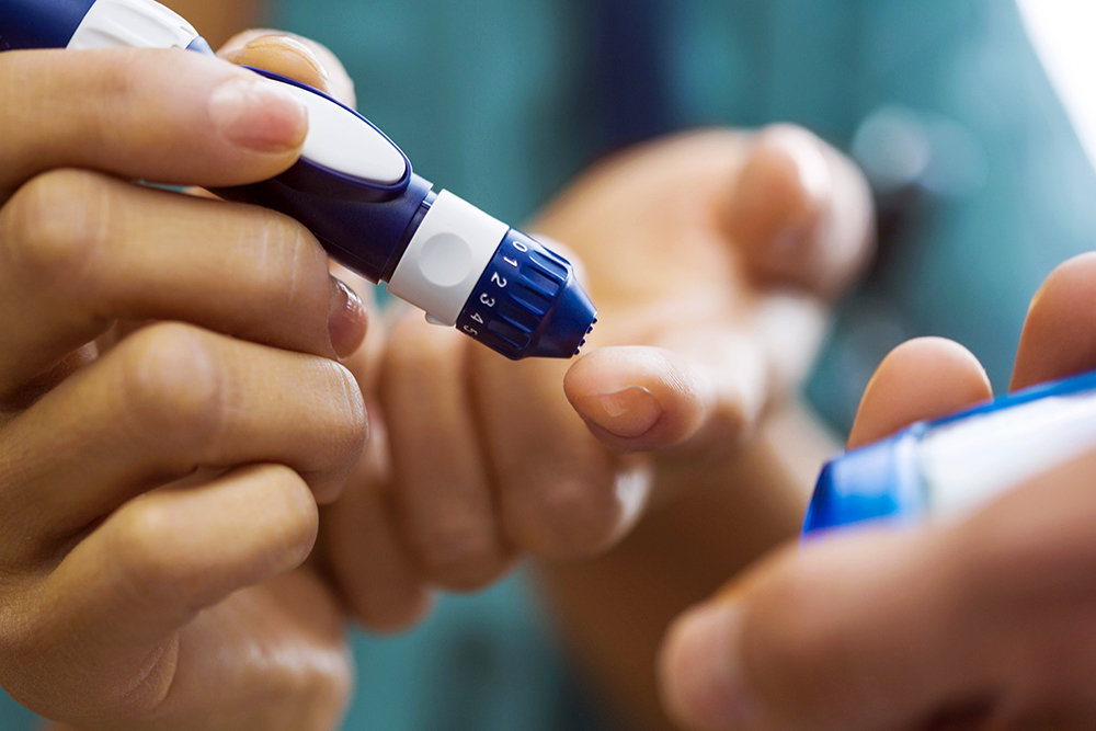 Finger receiving diabetes shot